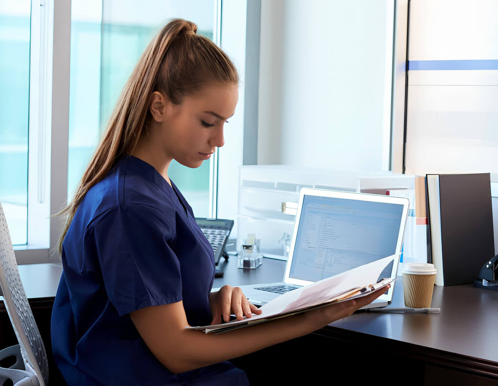 Nurse looking at chart
