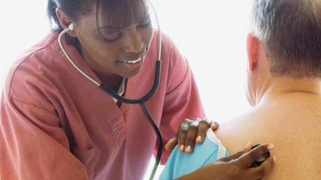 Woman doctor with stethoscope